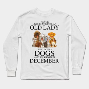 Never Underestimate An Old Lady Who Loves Dogs And Was Born In December Long Sleeve T-Shirt